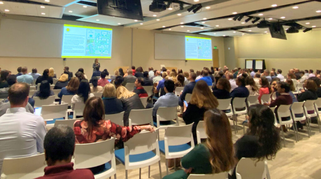 attendees at an HPC-AI Society annual meeting